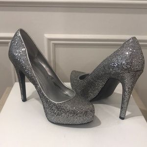 BCBGeneration Silver 5 dress shoes 4 1/4” heel. Front platform